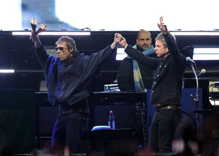 Liam and Noel Gallagher performing at Rose Bowl Stadium in 2025