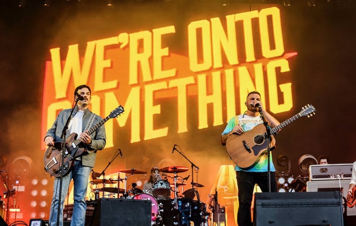 Kings Of Leon and Zach Bryan performing together live.