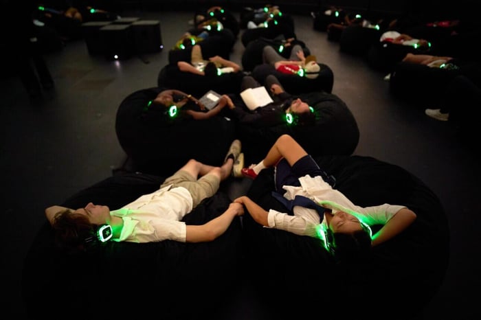 Visual projections and lyrics create an immersive Star Line experience.