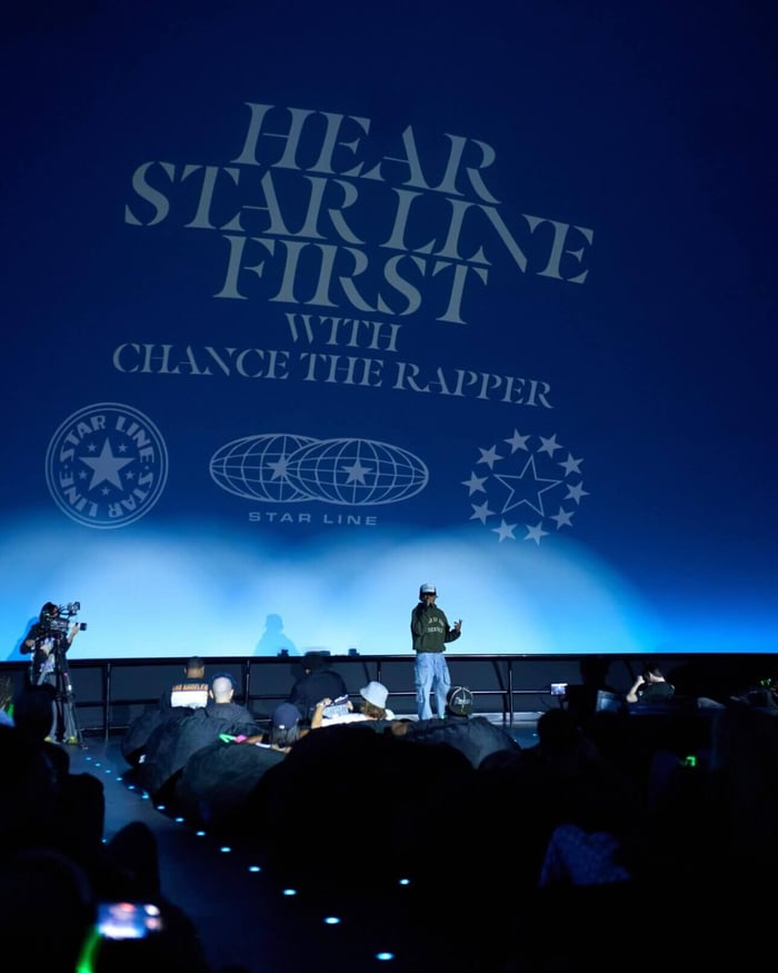 Attendees immersed in the Star Line listening experience inside the Adler Planetarium.