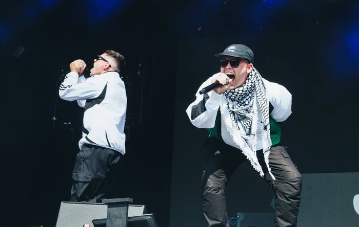 Kneecap's Mo Chara and Móglaí Bap perform at Glastonbury 2025. Credit: Andy Ford
