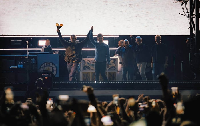 Oasis performing live, iconic band photo