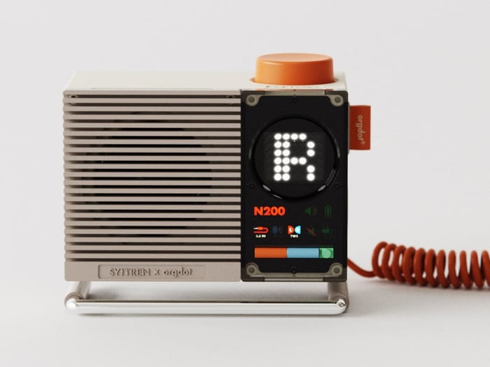 Organized desk scene featuring the N200 speaker