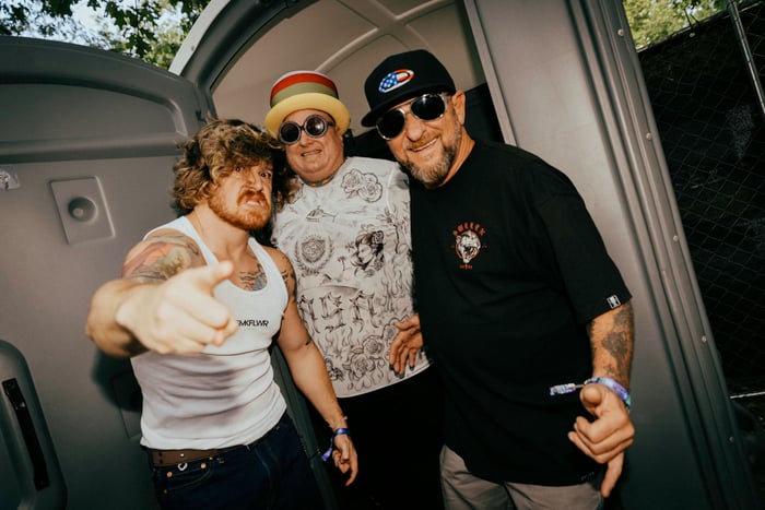 The reunited Sublime band posed outdoors