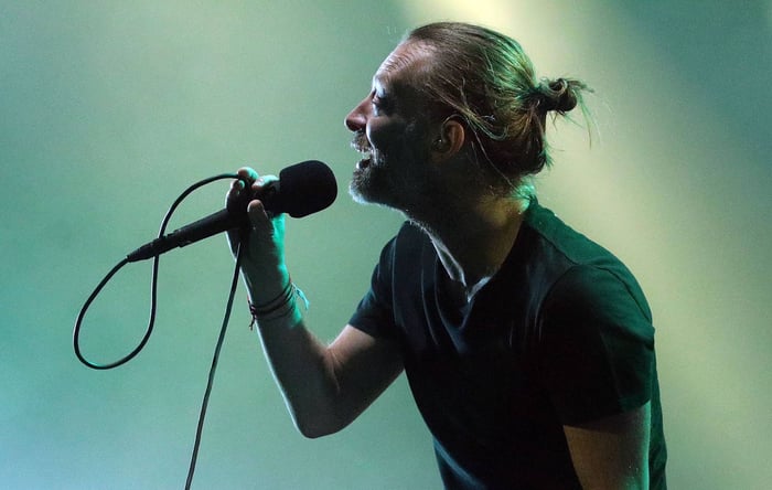 Thom Yorke of Radiohead performing on stage