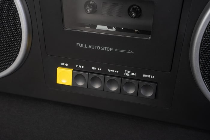 Four-speaker layout with chrome-trimmed cassette compartment