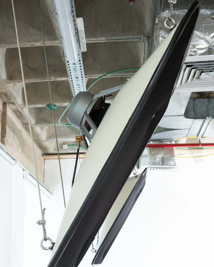 Side view showing the cables and exposed wiring