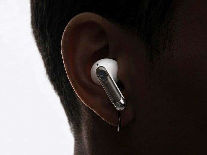 Close-up highlighting the sophisticated camera sensors embedded in the earbuds