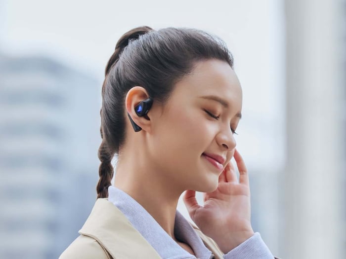 Close-up of ASUS ROG Cetra Open Wireless earbuds with ergonomic silicone hooks