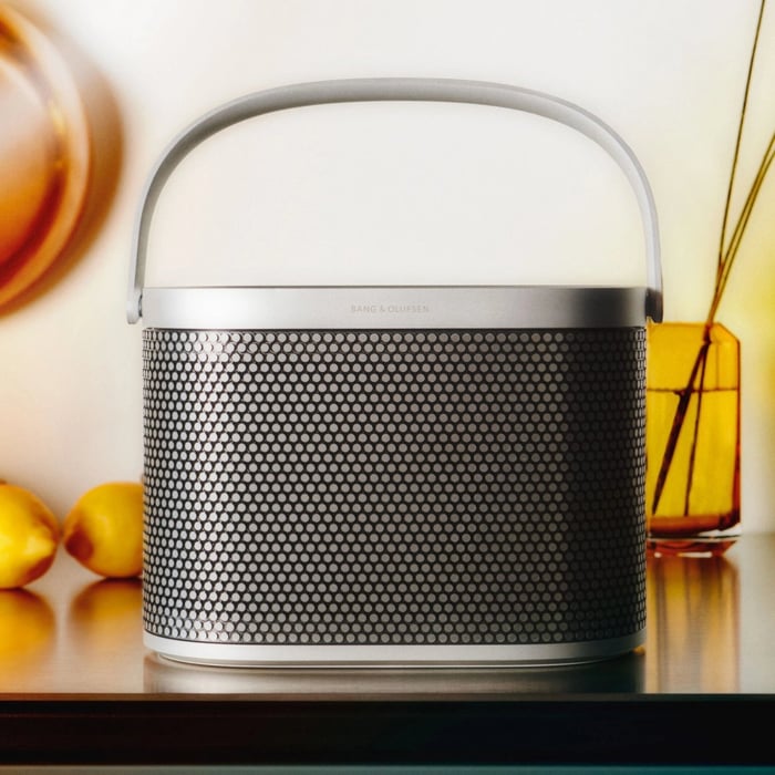 Beosound A5 portable speaker with beige and chestnut brown paper raffia weave