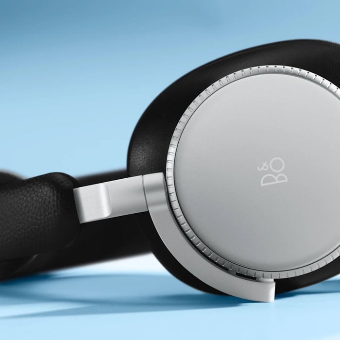 Close-up of the Beoplay H100 titanium drivers and design details