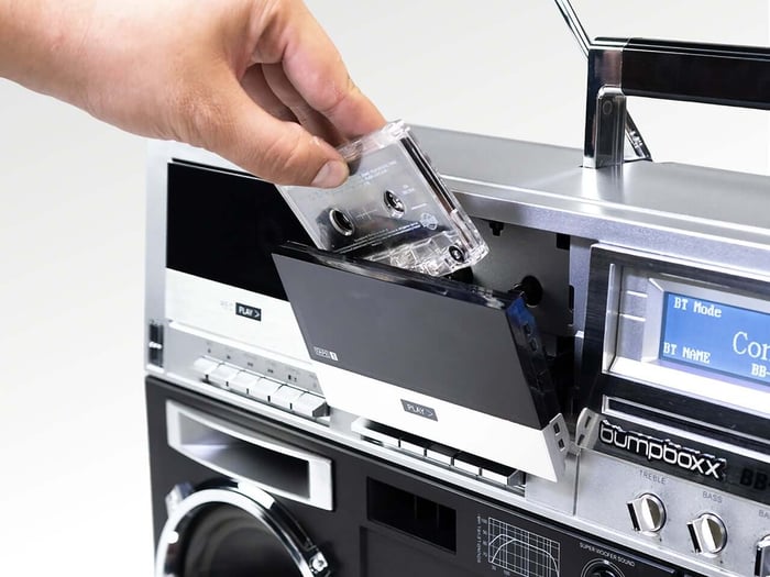 Bumpboxx BB-777 playing multiple formats: cassette, CD, radio, and Bluetooth.
