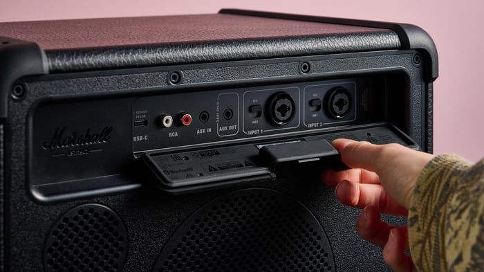 Close-up of Marshall Bromley 450 showing brass accents and eco-leather finish