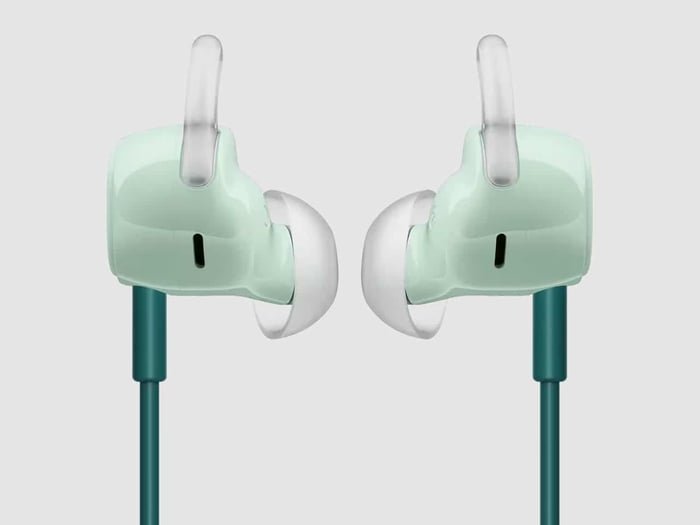 Bose earbuds and cable arranged for a closer look at the design