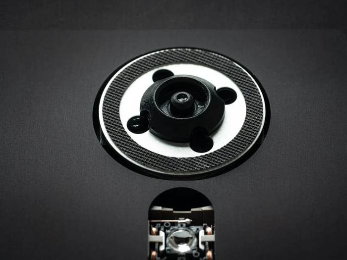 Close-up of the CD tray loading mechanism