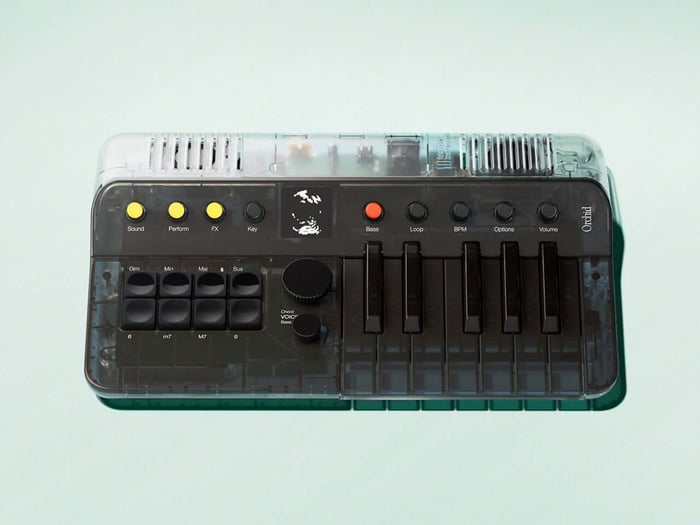Internal view of the Orchid synthesizer’s carefully arranged green PCB and ribbon cables