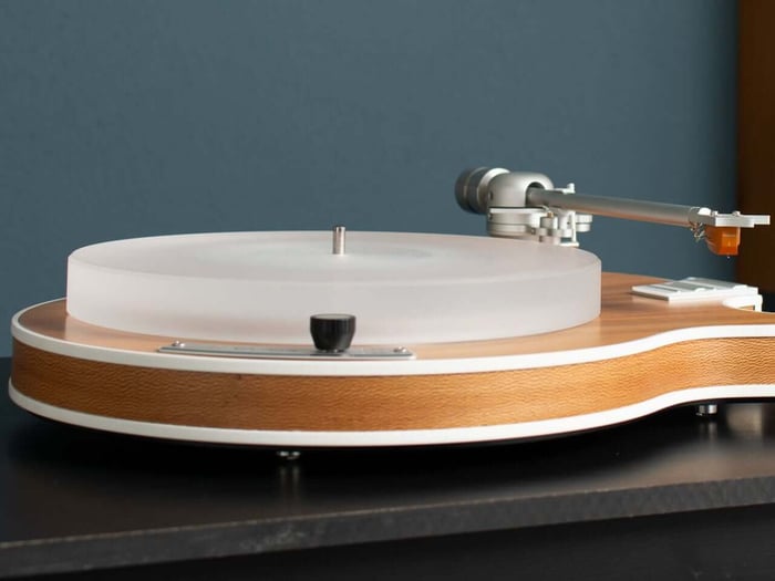 Clean, flowing silhouette capturing the essence of a legendary electric guitar.