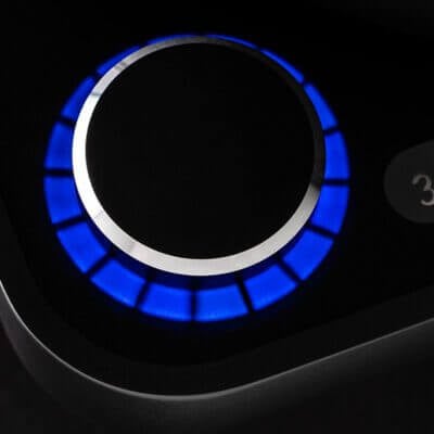 Close-up of the illuminated rotary touch controller with speed and power controls