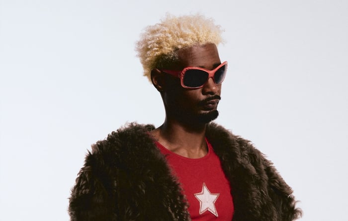 Danny Brown in a thoughtful pose