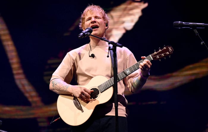 Ed Sheeran performing during his emotional live return