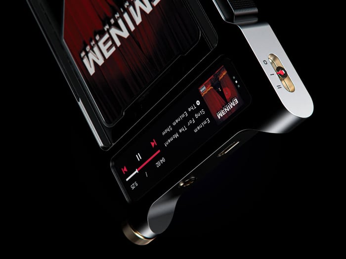 ENSA T1 playing music, digital screens show album art