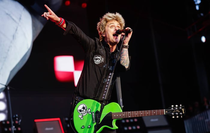 Billie Joe Armstrong Kicks Fan Off-Stage for Playing Oasis Instead of Green Day