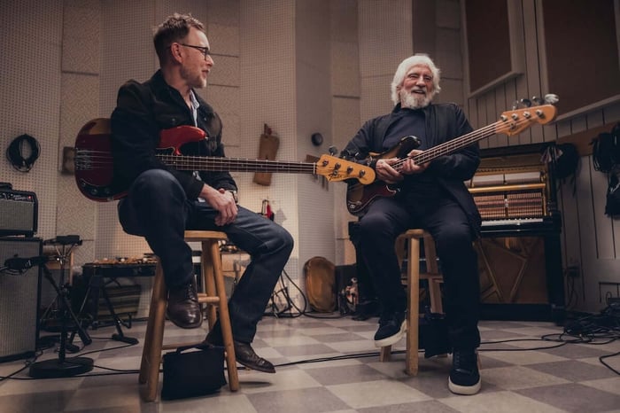 Geezer Butler with Foo Fighters bassist Nate Mendel. (Courtesy of Fender)