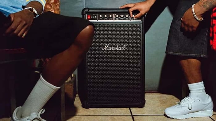 Marshall Bromley 750 glowing with warm stage lights