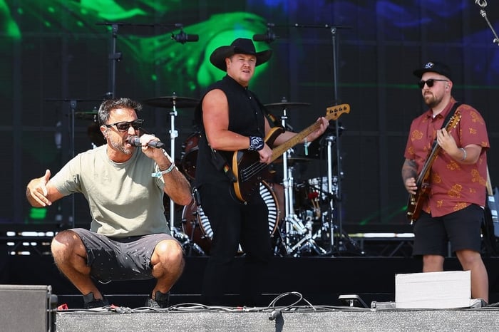 (L-R) Eric Rachmany, Marley D. Williams, and Kyle Ahern of Rebelution perform at the Outdoor Theatre during the 2023 Coachella Valley Music and Arts Festival