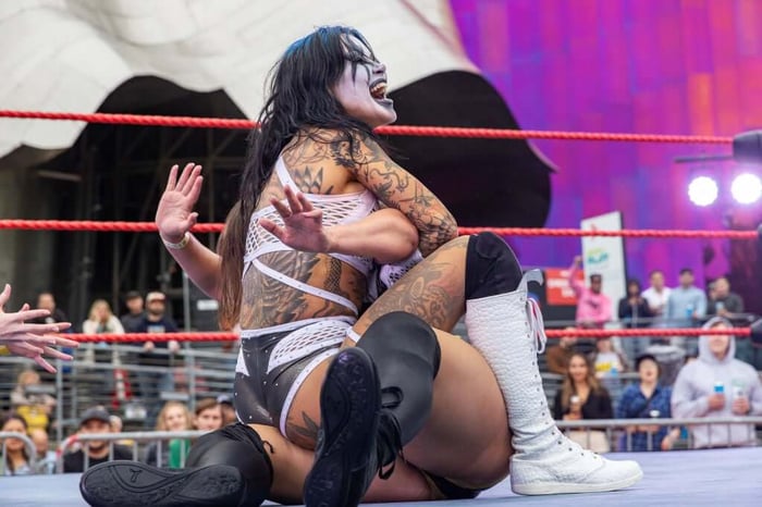 Vile Villain Tara Zep dominates Taryn from Accounting in the Bumbermania ring at Bumbershoot Arts and Music Festival, Seattle, Washington in 2023.