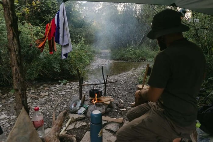 Ukrainian war veteran Serhii at a healing ceremony with shamans administering ayahuasca.