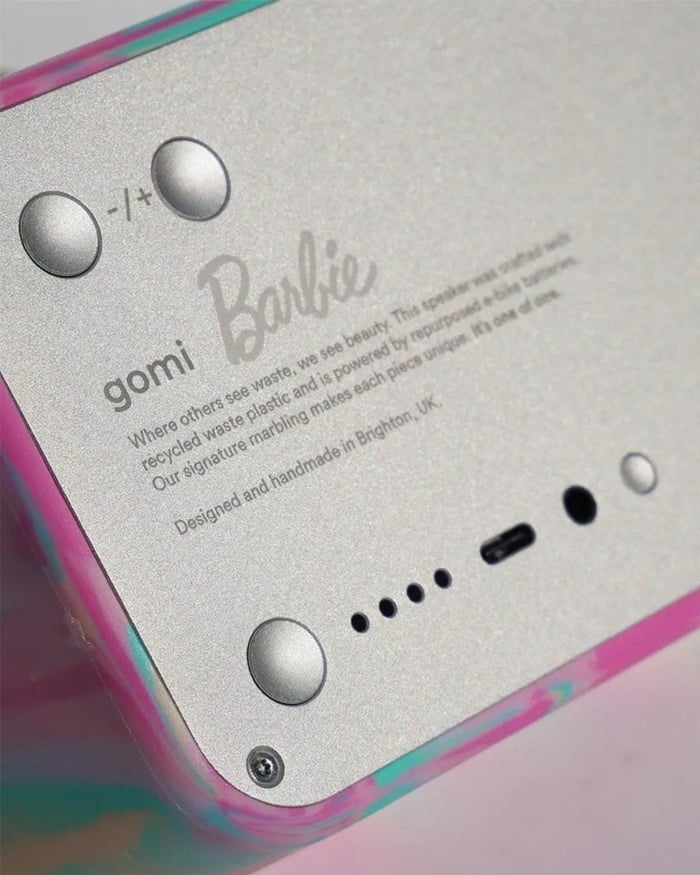 Handmade recycled-plastic power bank with visible color variations