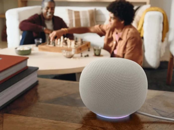 The Google Home Speaker glowing with a light ring