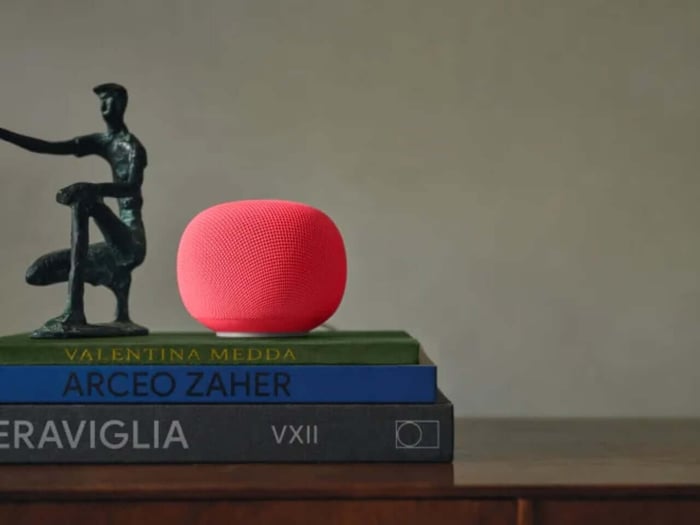 Google's rounded smart speaker in soft colors fitting into home decor