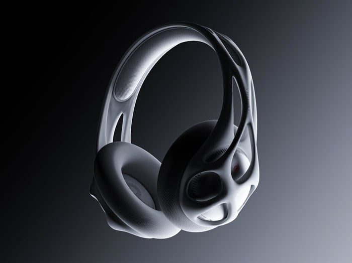 The headset in white and gray, emphasizing its bone-like aesthetics
