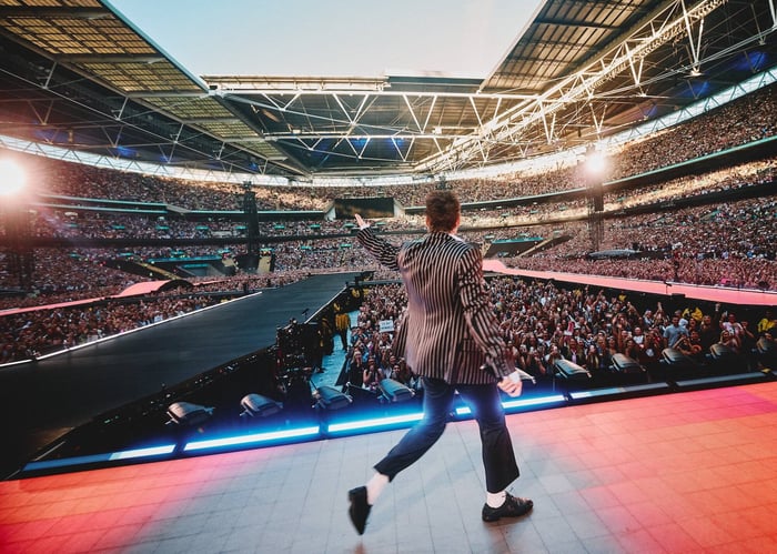 Harry Styles performing at Wembley. Credit: Anthony Pham