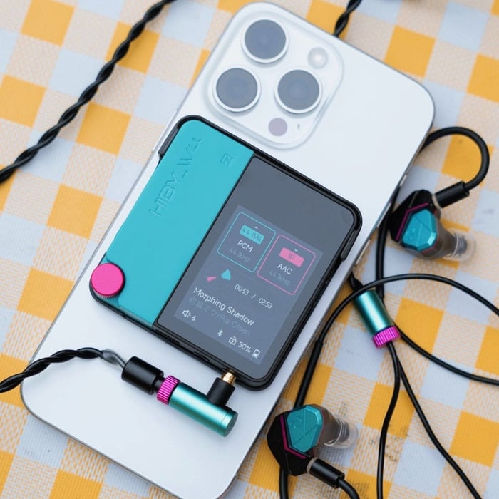 HiBy W4 shown with its optional magnetic phone attachment