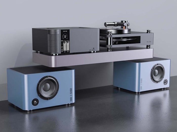 Amplifier and speakers in warm, inviting colors