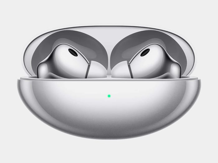 Huawei FreeBuds Neo earbuds shown in a cinematic spatial-audio product composition