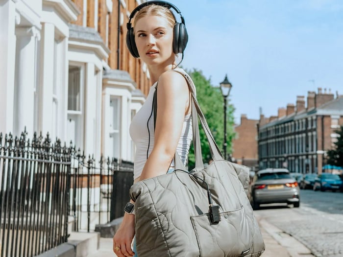Go blu Air DAC in hand showcasing its size