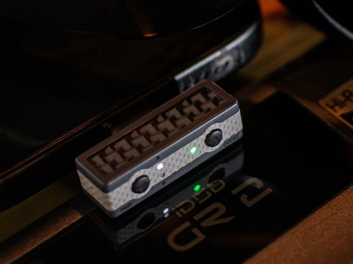 iFi Audio UP Play Max transmitter shown at an angle