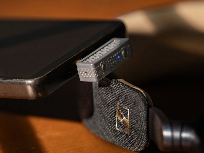 Compact iFi Audio UP Play Max transmitter designed for mobile devices
