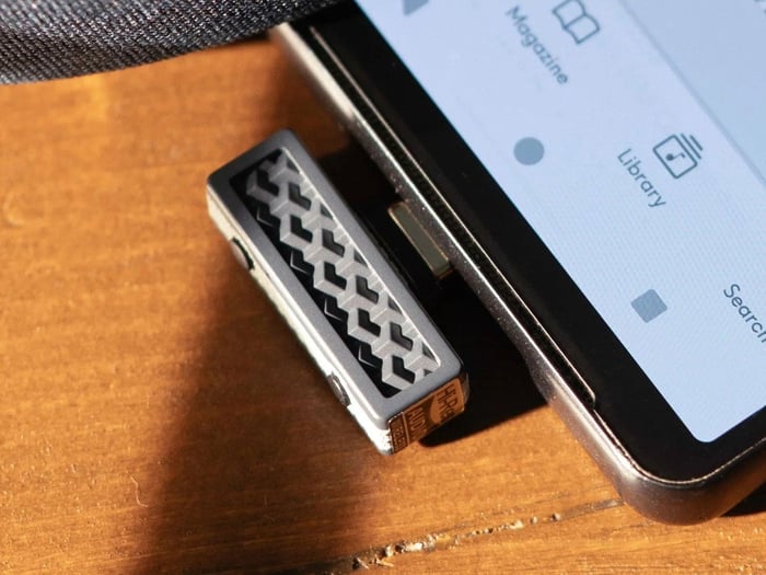 iFi Audio UP Play Max compact transmitter beside a USB-C connection