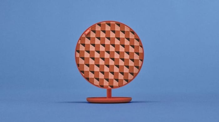 Available in beige, white, orange, and green, these speakers certainly add a pop of color.