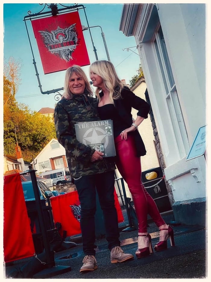Mike and Jules outside of their pub, The Red, Dyserth, in 2023.