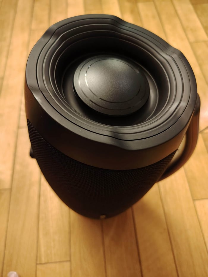 Speaker standing vertically on its side