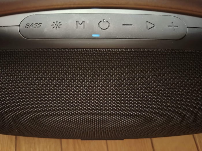 RGB lighting glowing around speaker sides