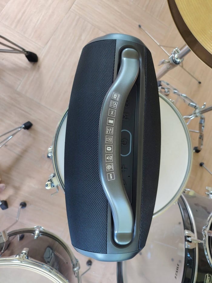 Detail of the top panel controls and sturdy handle.
