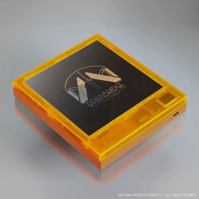 Close-up of the translucent orange CD player housing