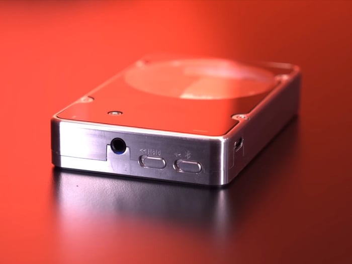 Bluetooth-enabled modded iPod connected to headphones